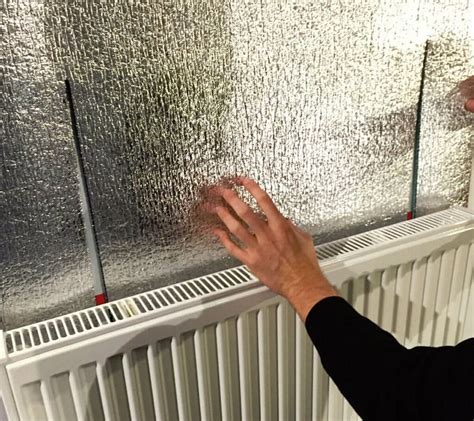 sheet metal behind radiator|reflective insulation behind radiators.